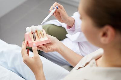 patient learning about dental implants doncaster 