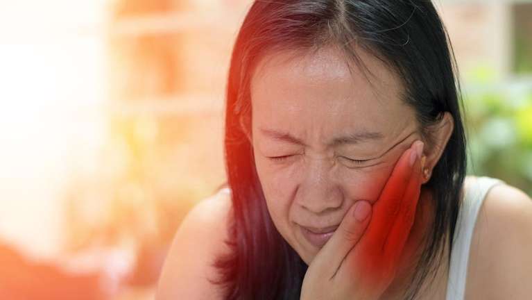 woman with a toothache in doncaster