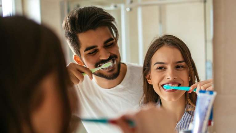 oral health doncaster | couple brushing teeth